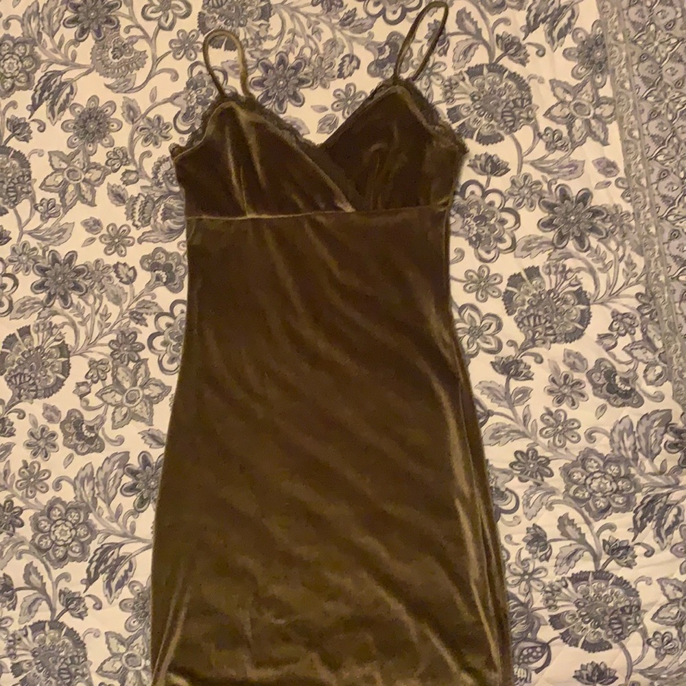 Tight green velvety dress